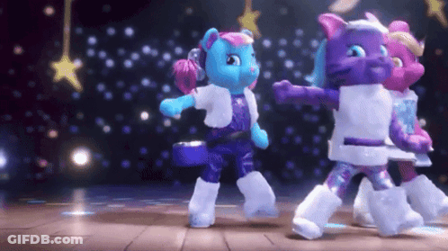 Three Stuffed Animals Are Dancing On A Stage With Stars In The Background GIF