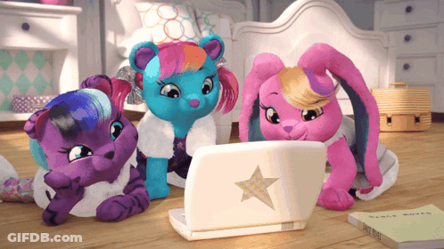 Three Stuffed Animals Are Looking At A Laptop With A Star On The Front GIF
