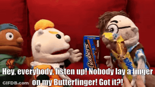 Three Stuffed Animals Are Standing Around A Box Of Grobers Chocolate Bars GIF