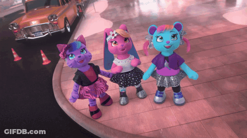 Three Stuffed Animals Are Standing Next To Each Other On A Street GIF
