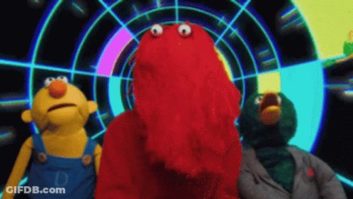 Three Stuffed Animals Including Elmo GIF