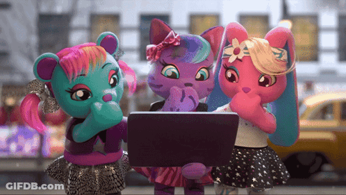 Three Stuffed Animals Looking At A Laptop Together GIF