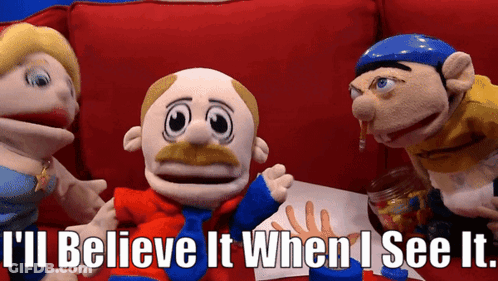 Three Stuffed Animals On Red Couch GIF