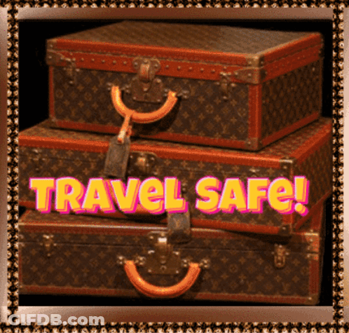 Three Suitcases Are Stacked On Top Of Each Other With The Words Travel Safe Written In Pink GIF