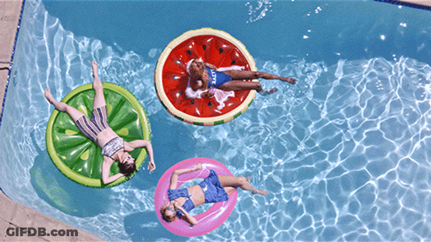 Three Woman Sunbathing In The Pool GIF