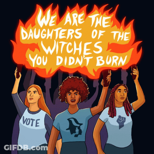 Three Women Are Holding Candles In Front Of A Sign That Says We Are The Daughters Of The Witches GIF