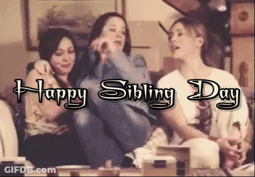 Three Women Are Sitting On A Couch With The Words Happy Sibling Day Below Them GIF