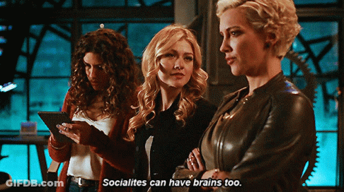 Three Women Are Standing Next To Each Other And One Of Them Says " Socialites Can Have Brains Too " . GIF
