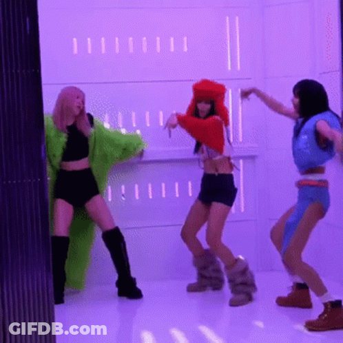 Three Women Dancing In Front Of Purple Wall GIF