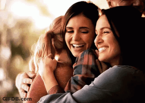 Three Women Hugging And Smiling GIF