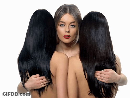 Three Women Hugging Each Other With Different Colored Hair GIF
