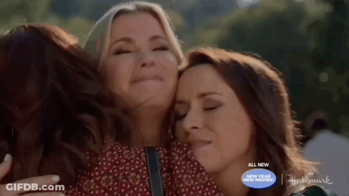 Three Women Hugging Hallmark Sign GIF