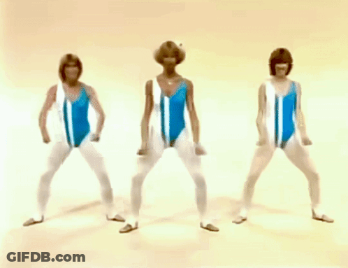 Three Women In Blue And White Swimsuits Are Standing In A Row With Their Hands On Their Hips GIF