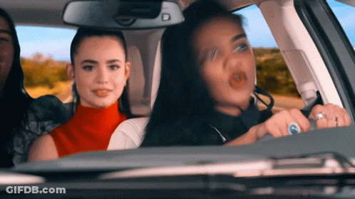 Three Women In Car With Ring GIF
