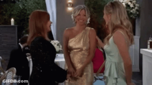 Three Women In Dresses Talking GIF