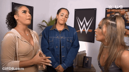 Three Women In Front Of W Logo GIF