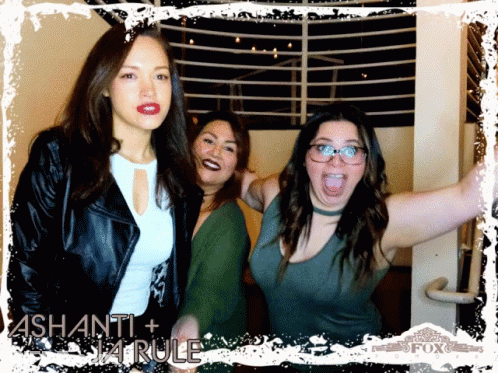 Three Women Pose For A Photo With The Name Ashanti On It GIF