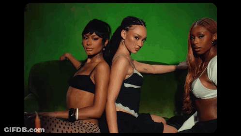 Three Women Posing On Green Background GIF