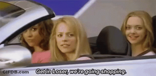 Three Women Sitting In Car One Talking About Shopping GIF