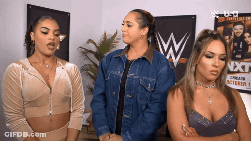 Three Women Standing By NXT Poster GIF