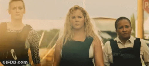Three Women Standing By Parking Sign GIF