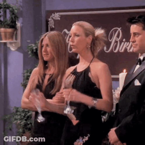 Three Women Standing In Front Of A Sign That Says Birdie GIF