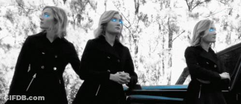 Three Women Standing Next To Car With Blue Eyes GIF