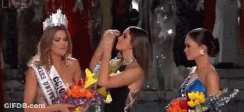 Three Women Standing On Pageant Stage GIF