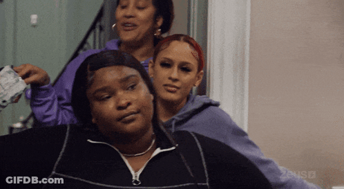 Three Women Standing One Holding Money GIF
