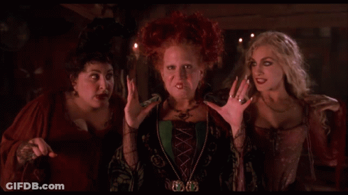Three Women Standing With Sally Necklace GIF