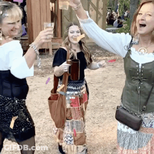 Three Women Toasting With Arms In Air GIF
