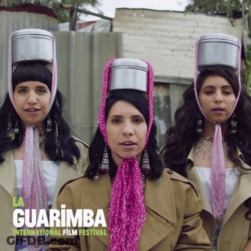 Three Women Wearing Pots On Heads Guarimba International Film Festival GIF