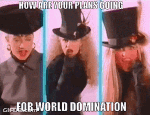 Three Women Wearing Top Hats With The Words How Are Your Plans Going For World Domination On The Bottom GIF