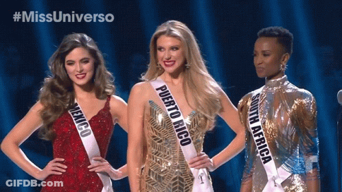 Three Women With Sashes For Puerto Rico Mexico South Africa On Stage GIF