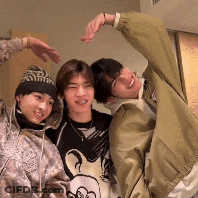 Three Young Men Posing One Wearing Snoop Dogg Sweater GIF