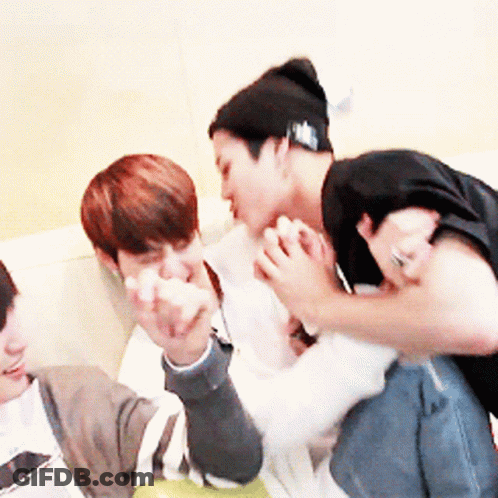 Three Young Men Sitting On Couch Pointing GIF