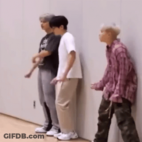 Three Young Men Standing Side By Side GIF
