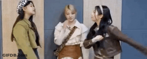 Three Young Women Standing Next To Each Other GIF