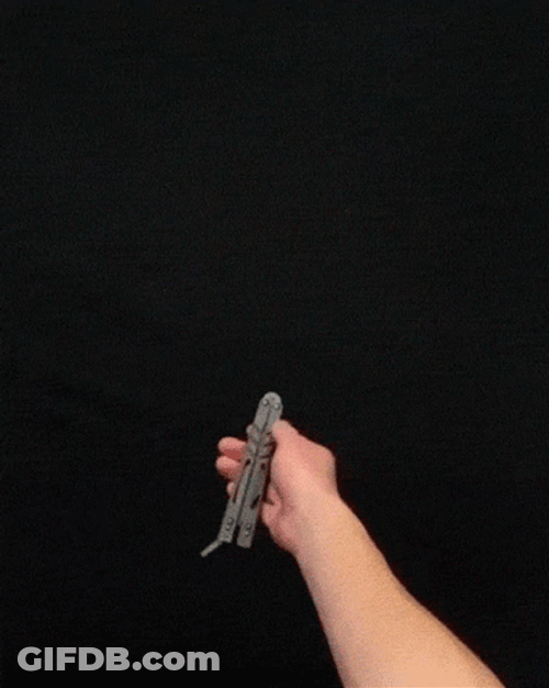 Thrilling Butterfly Knife Stunt GIF