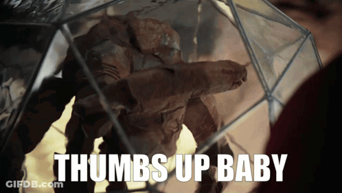 Thumbs Up Baby Statue GIF