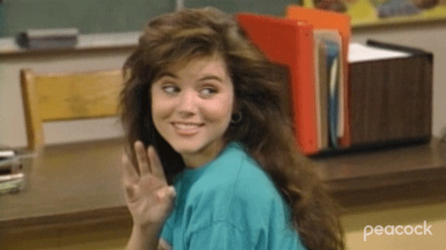 Tiffani Thiessen Flirting Wave GIF