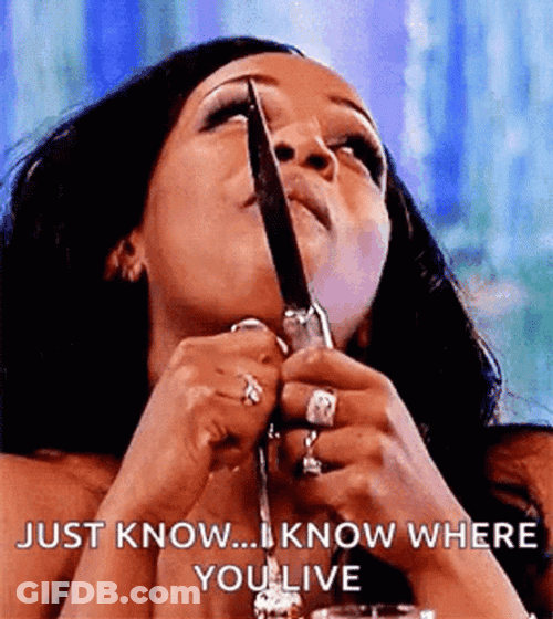 Tiffany Pollard Holding Knife While Eating GIF
