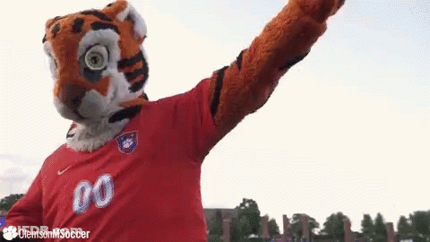 Tiger Mascot In Red Shirt Number 00 GIF