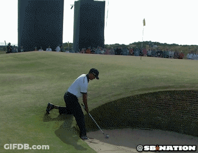 Tiger Woods Trying A Burried Strike GIF