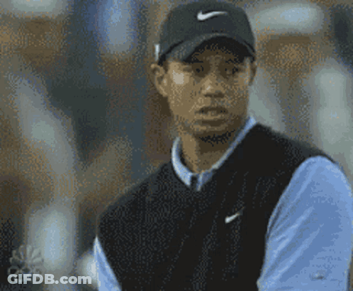 Tiger Woods Wearing Black Nike Hat GIF