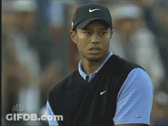 Tiger Woods Wearing Nike Hat And Blue Shirt GIF