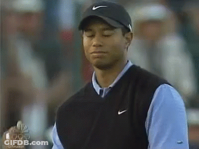 Tiger Woods Wearing Nike Hat And Vest GIF