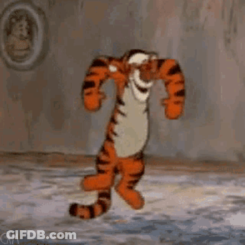 Tigger From Winnie The Pooh Is Dancing In A Room In Front Of A Wall . GIF