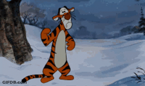 Tigger From Winnie The Pooh Is Walking In The Snow GIF