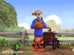 Tigger Standing Next To Wagon GIF